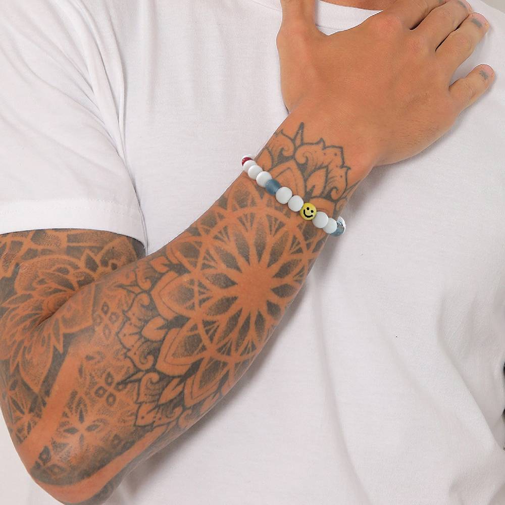 Kuzzoi Armband mit Smiling Face | Harzperlen Bestseller