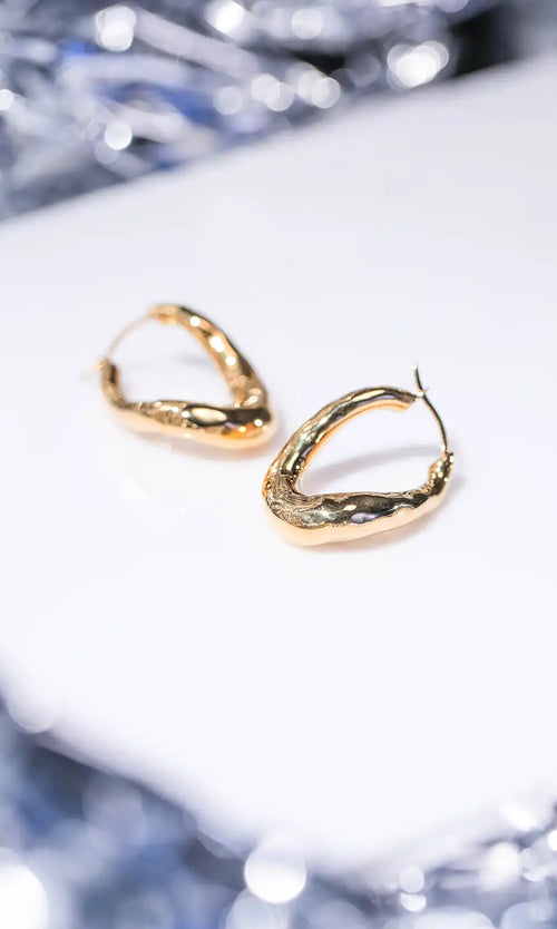 Paul Valentine Molten Twisted Hoops 50% Rabatt mit kostenlosem Versand
